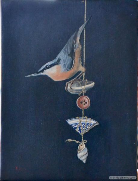 Nut hatch perched on Found Objects
